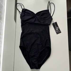 New and never worn Wear Moi leotard with tags.